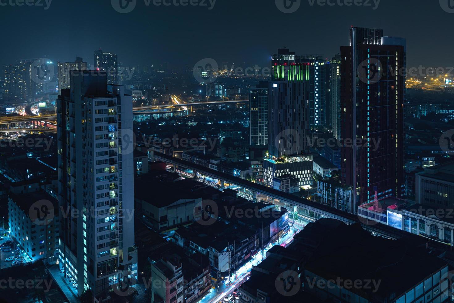 Scenic view of Modern Bangkok city at night photo