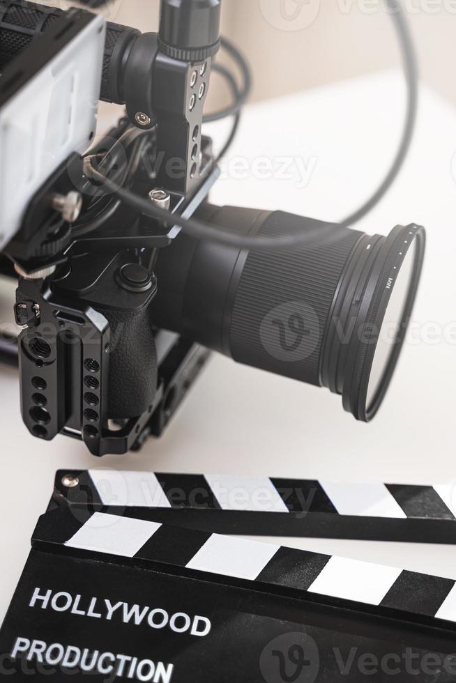 Modern mirrorless camera rig and clapperboard photo