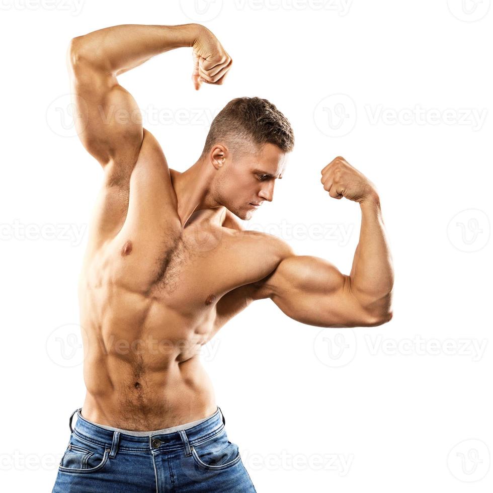 Handsome and muscular guy on white background photo