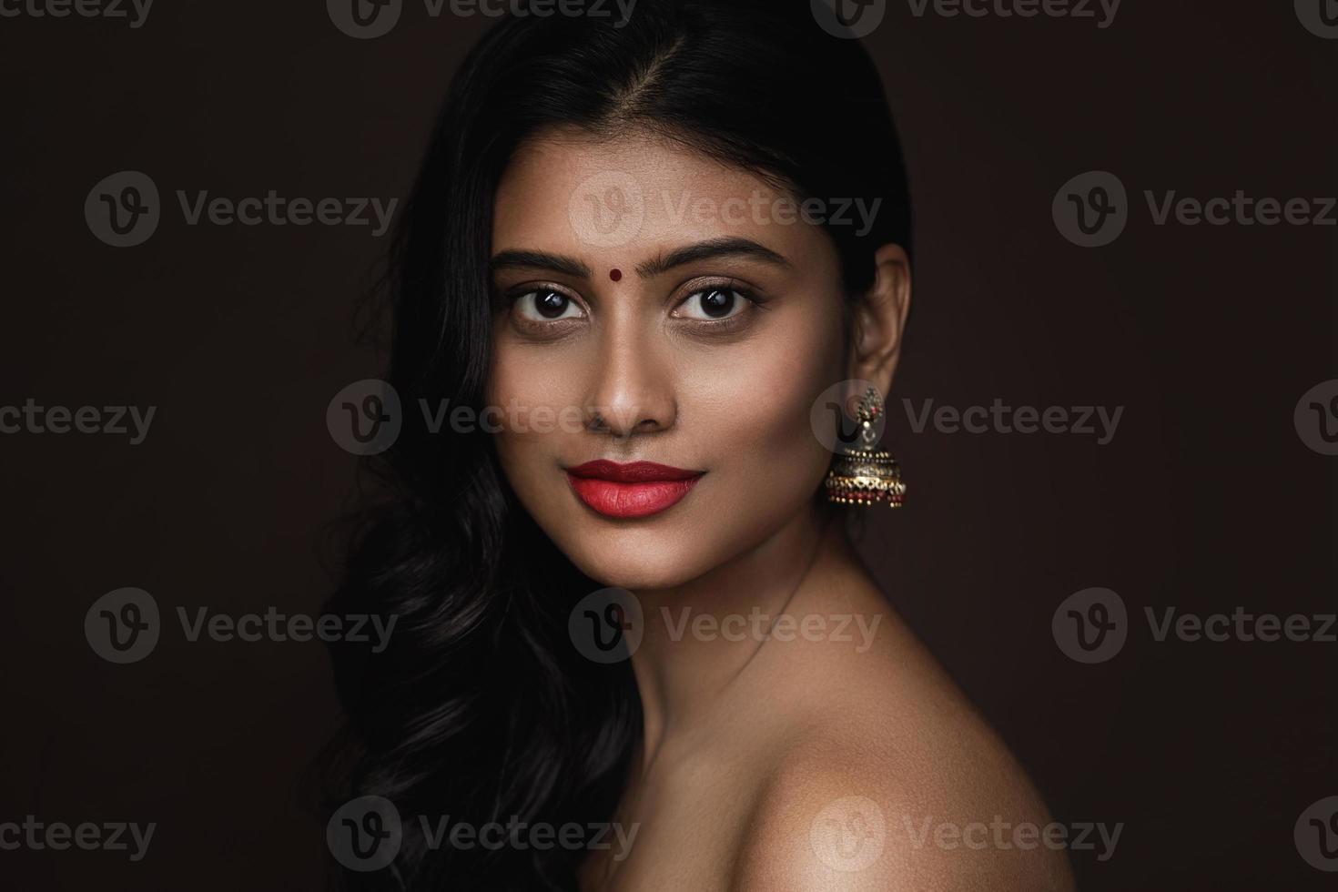 Portrait of Indian woman with beautiful makeup and hairstyle photo