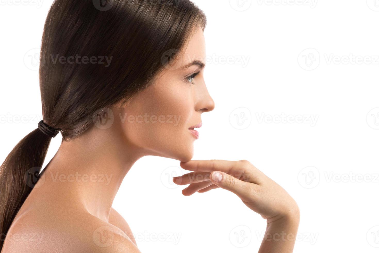 Portrait of young beautiful woman on white background photo