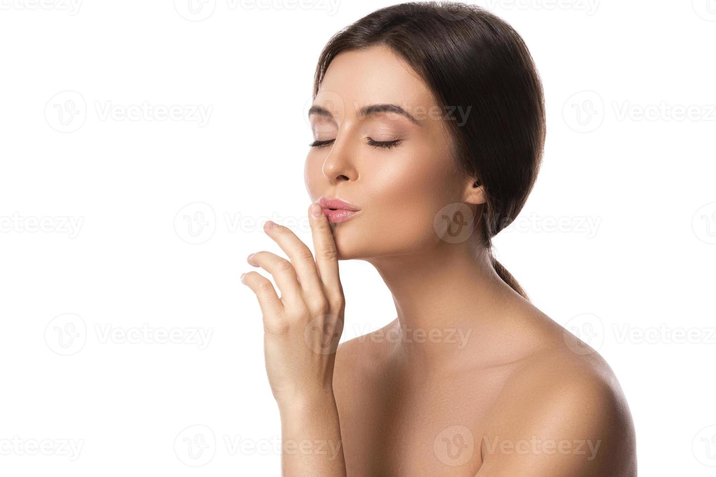 Portrait of young beautiful woman on white background photo