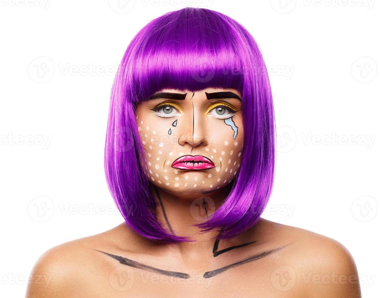 Model in creative image with pop art makeup photo