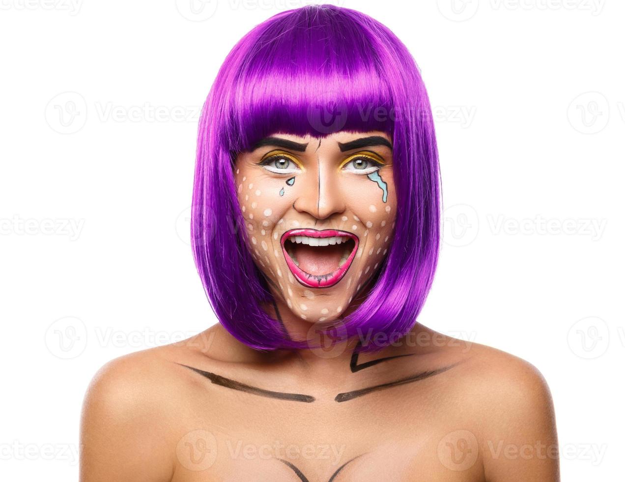 Model in creative image with pop art makeup photo