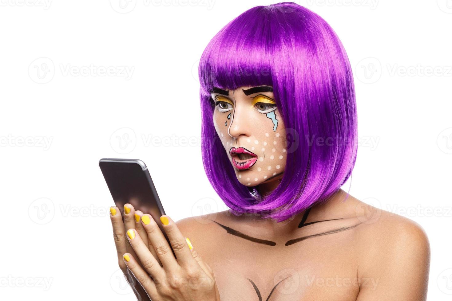 Model in creative image with pop art makeup photo