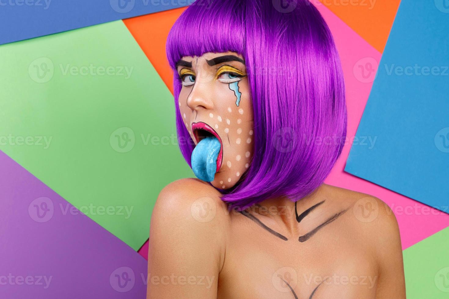 Model in creative image with pop art makeup photo