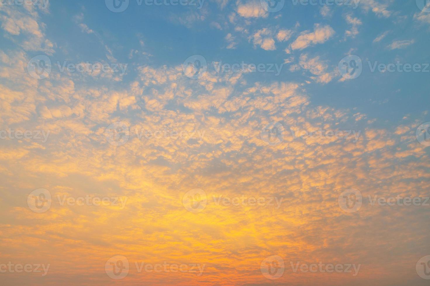 Scenic lightly cloudy sky during the sunrise photo