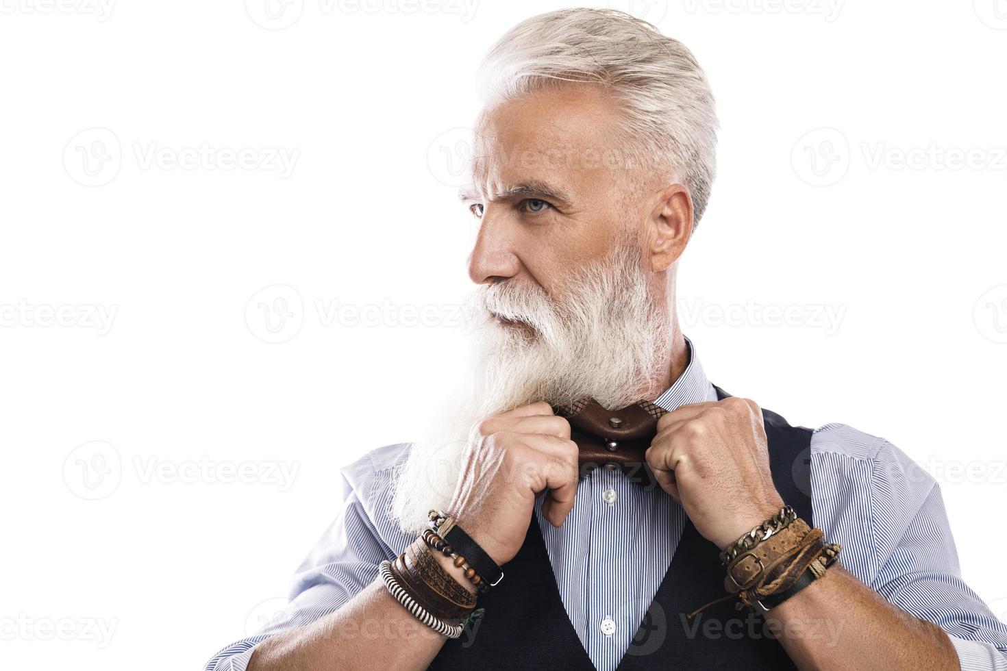 Handsome aged male model posing on white background photo