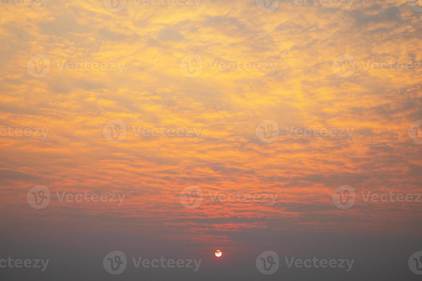 Scenic lightly cloudy sky during the sunrise photo
