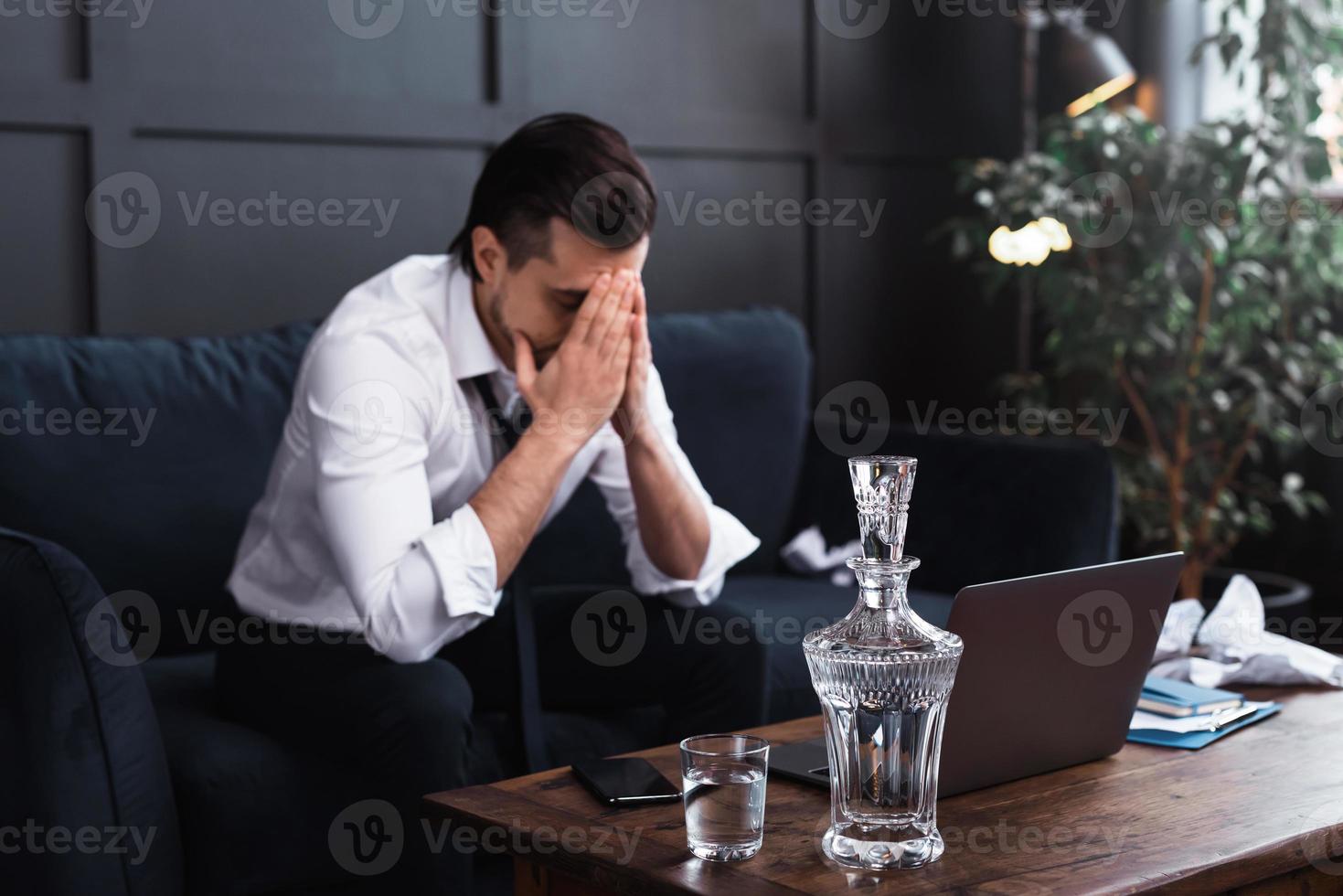 Man and vodka. Concepts of alcoholism or problems in life. photo