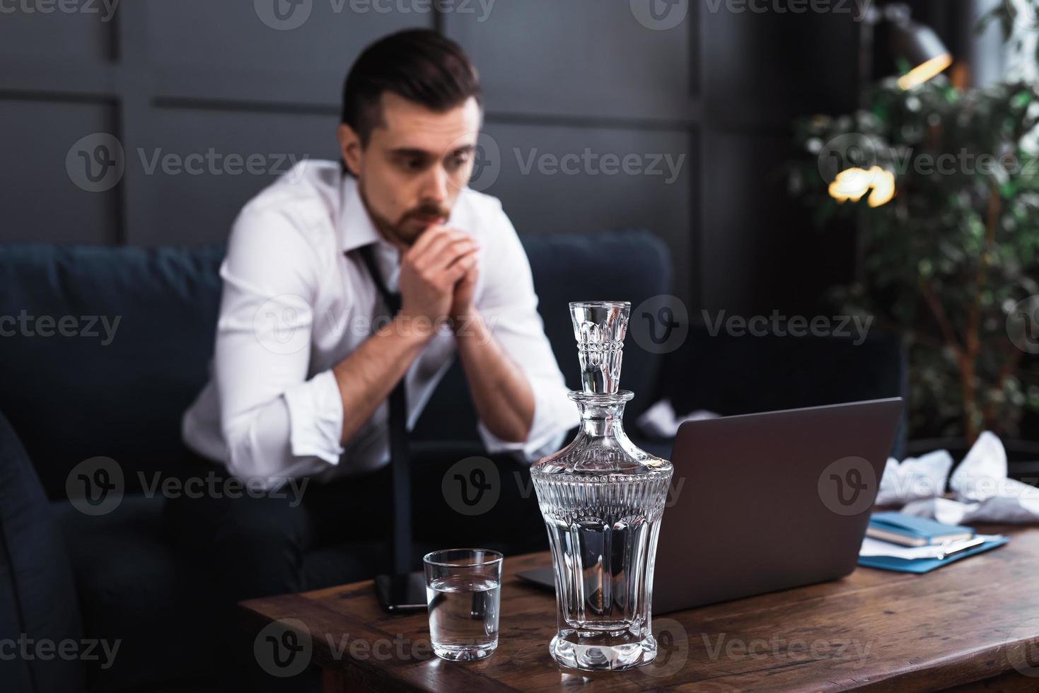 Man and vodka. Concepts of alcoholism or problems in life. photo