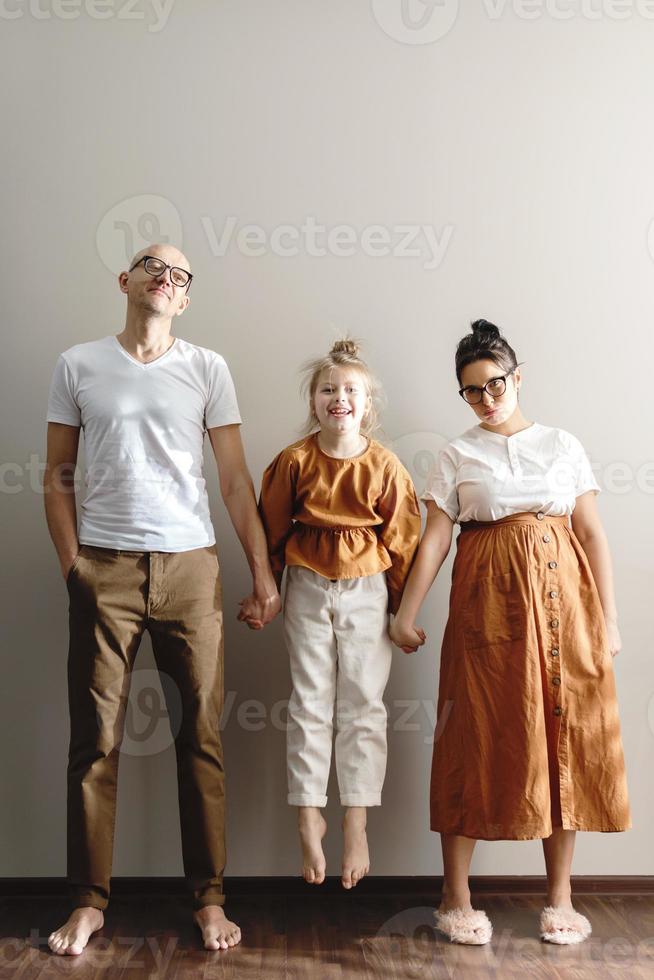 Happy funny family having fun home photo