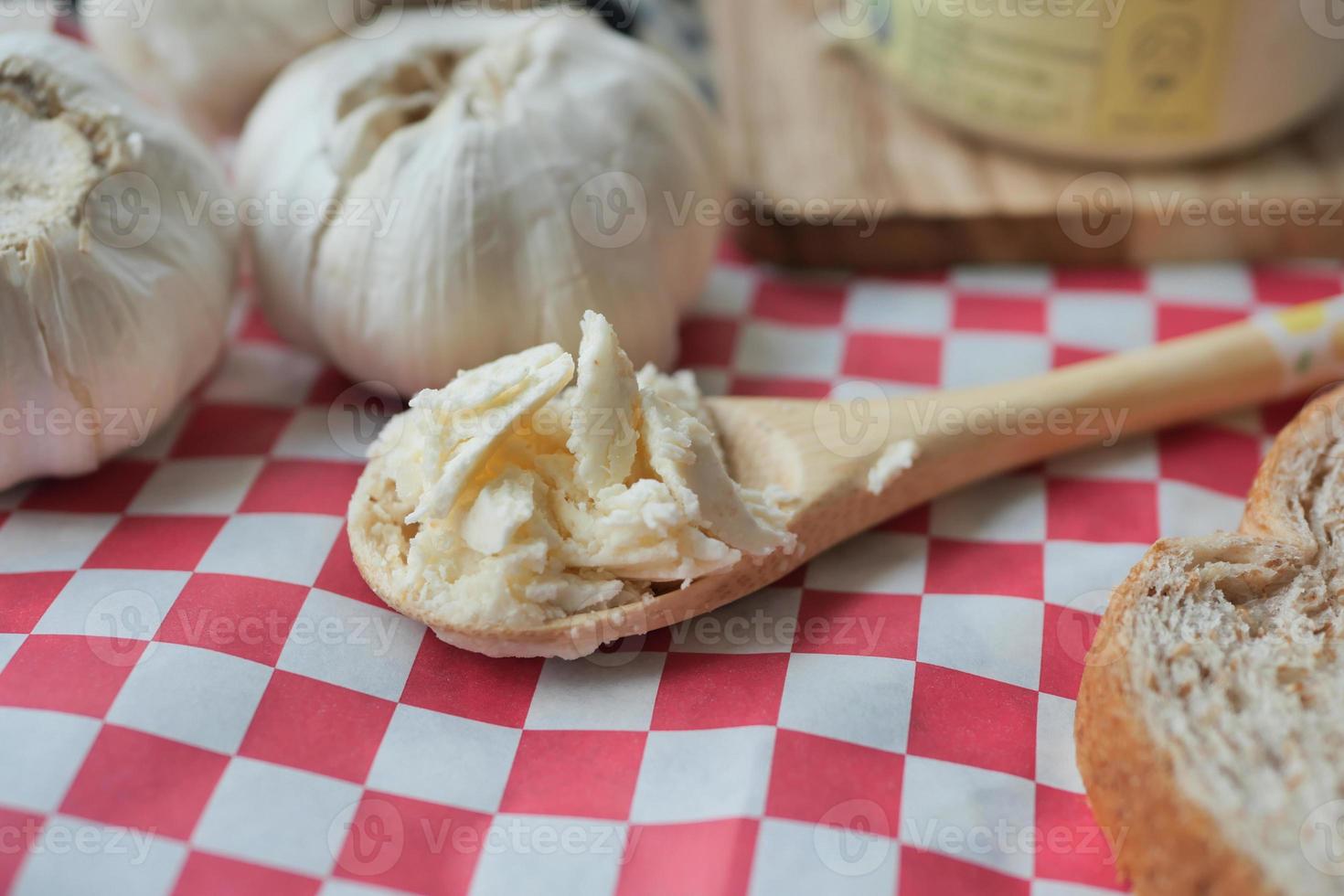 top view of garlic spread on a spoon photo