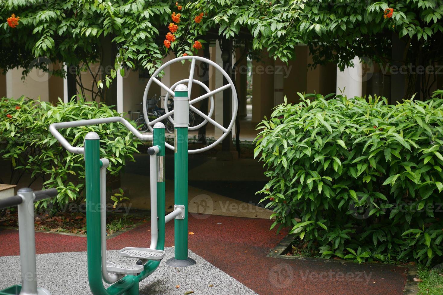 Exercise equipment in a public park i in residential area photo