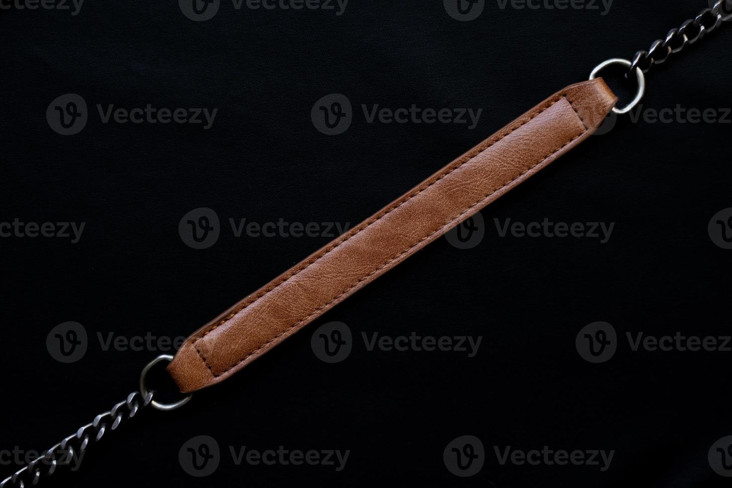 brown leather strap with chain photo