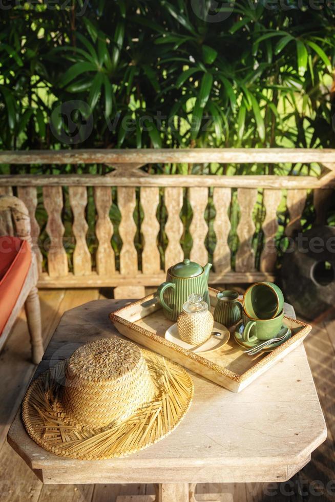 Coffee on the tray on summer terrace photo