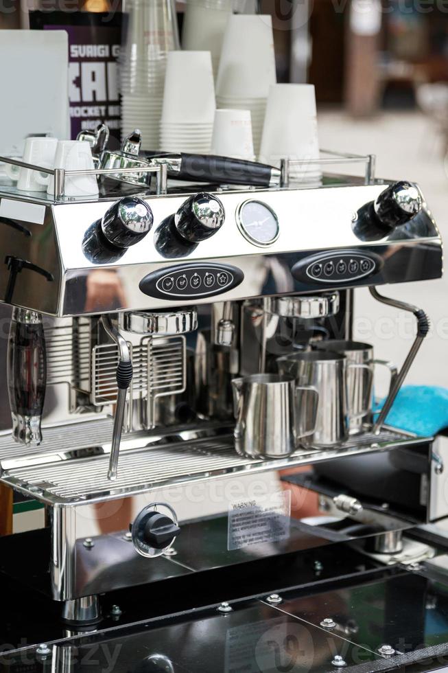 Professional espresso machine in outdoor coffee shop photo