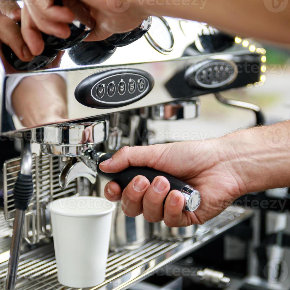 Barista making coffee using professional espresso machine 16249905 Stock Photo at Vecteezy