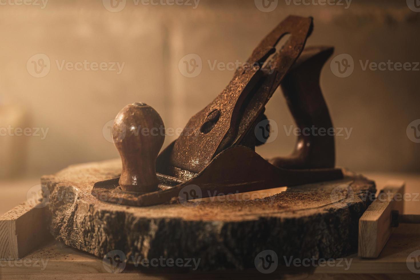 Old wood planer in the carpentry workshop photo