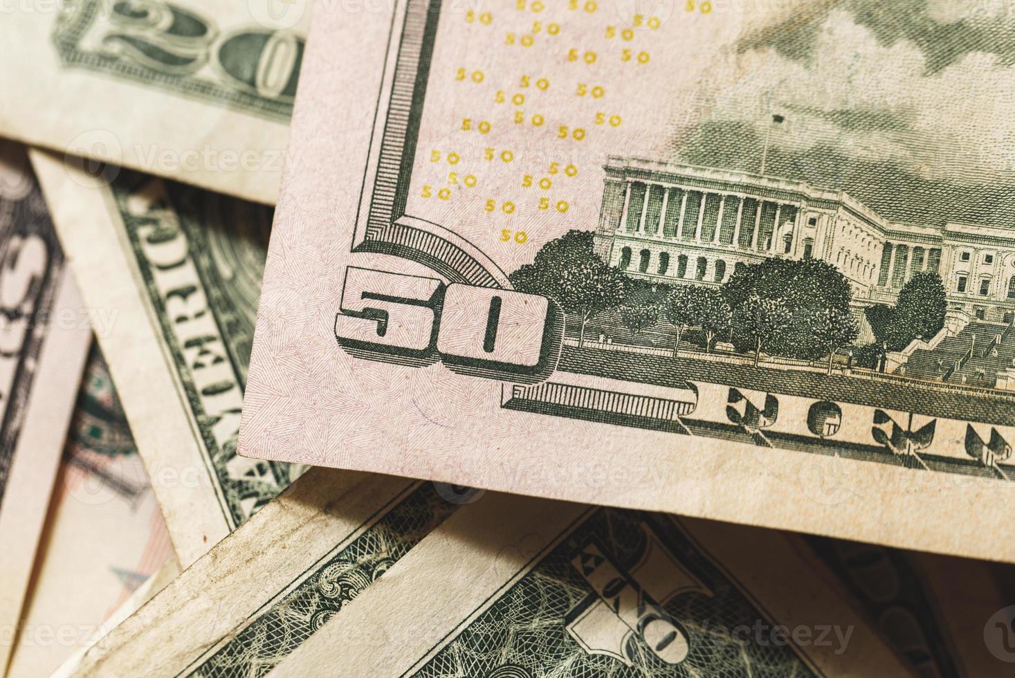 Close-up of the different US dollar bills. photo