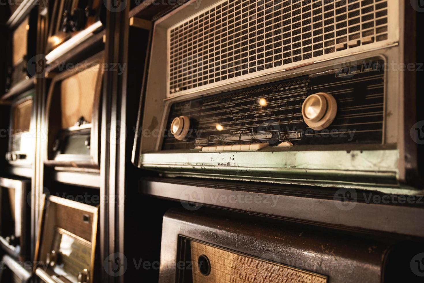 Background with a different old radio receivers photo