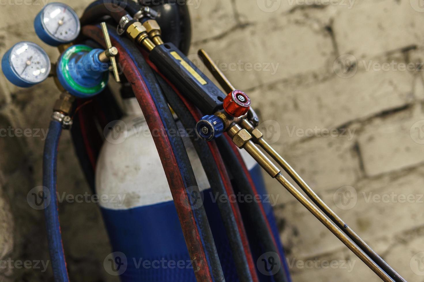 Oxy-fuel welding and cutting station in workshop photo