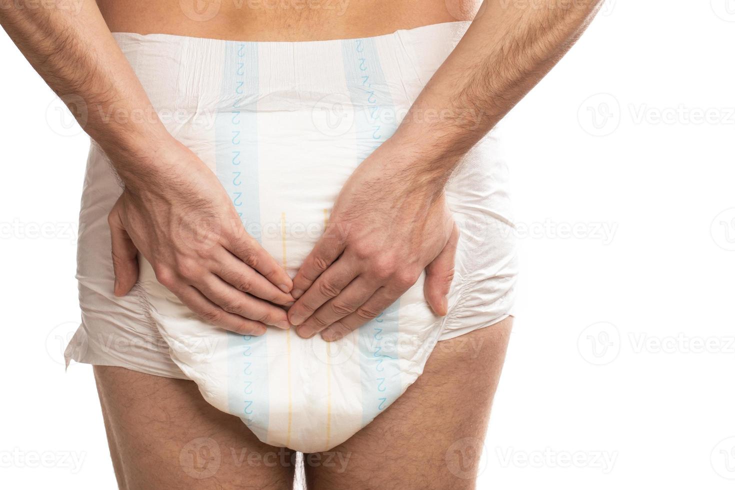 mujer vistiendo pañales para adultos contra el fondo blanco. 16293048 Foto  de stock en Vecteezy