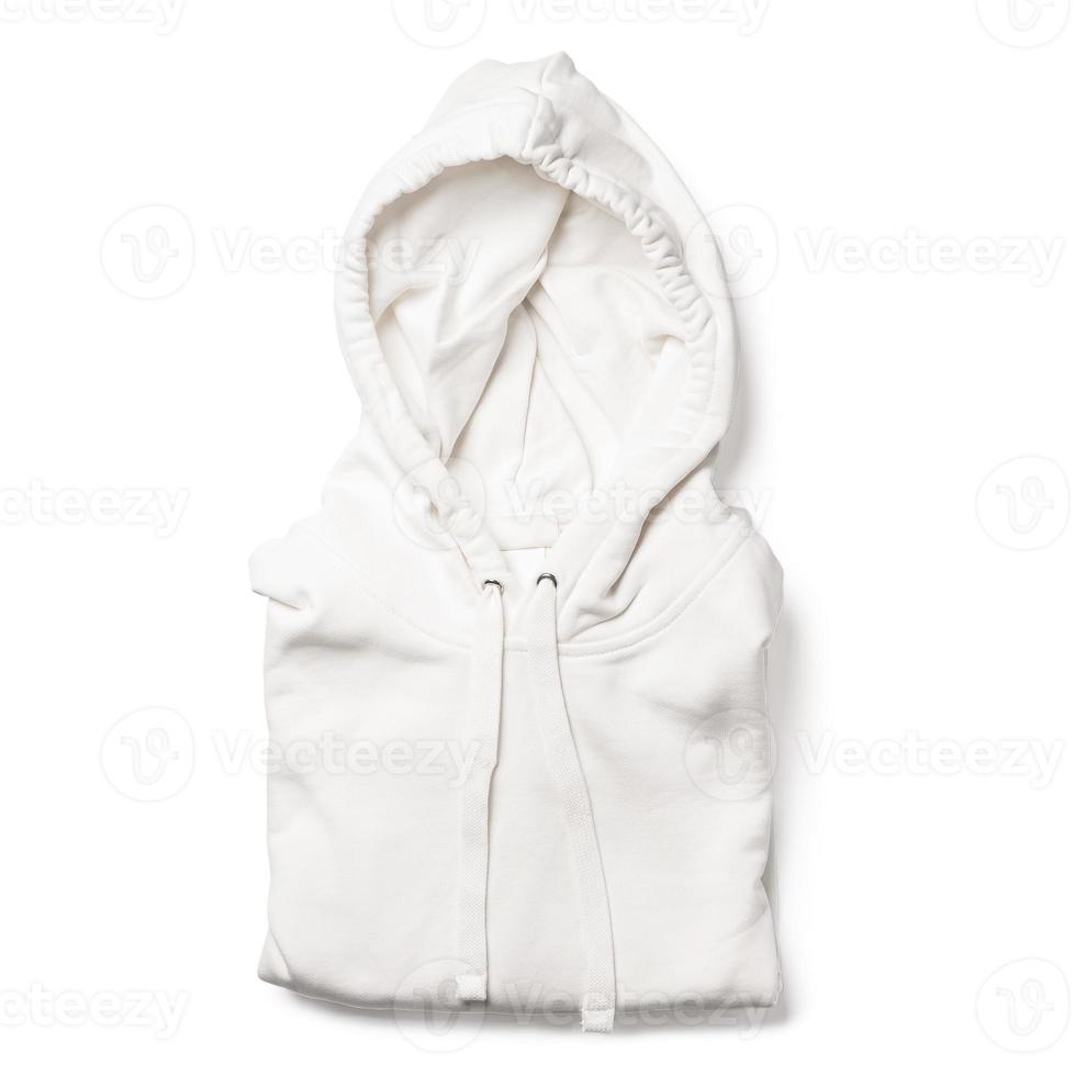 Partially folded white hoodie on white background photo