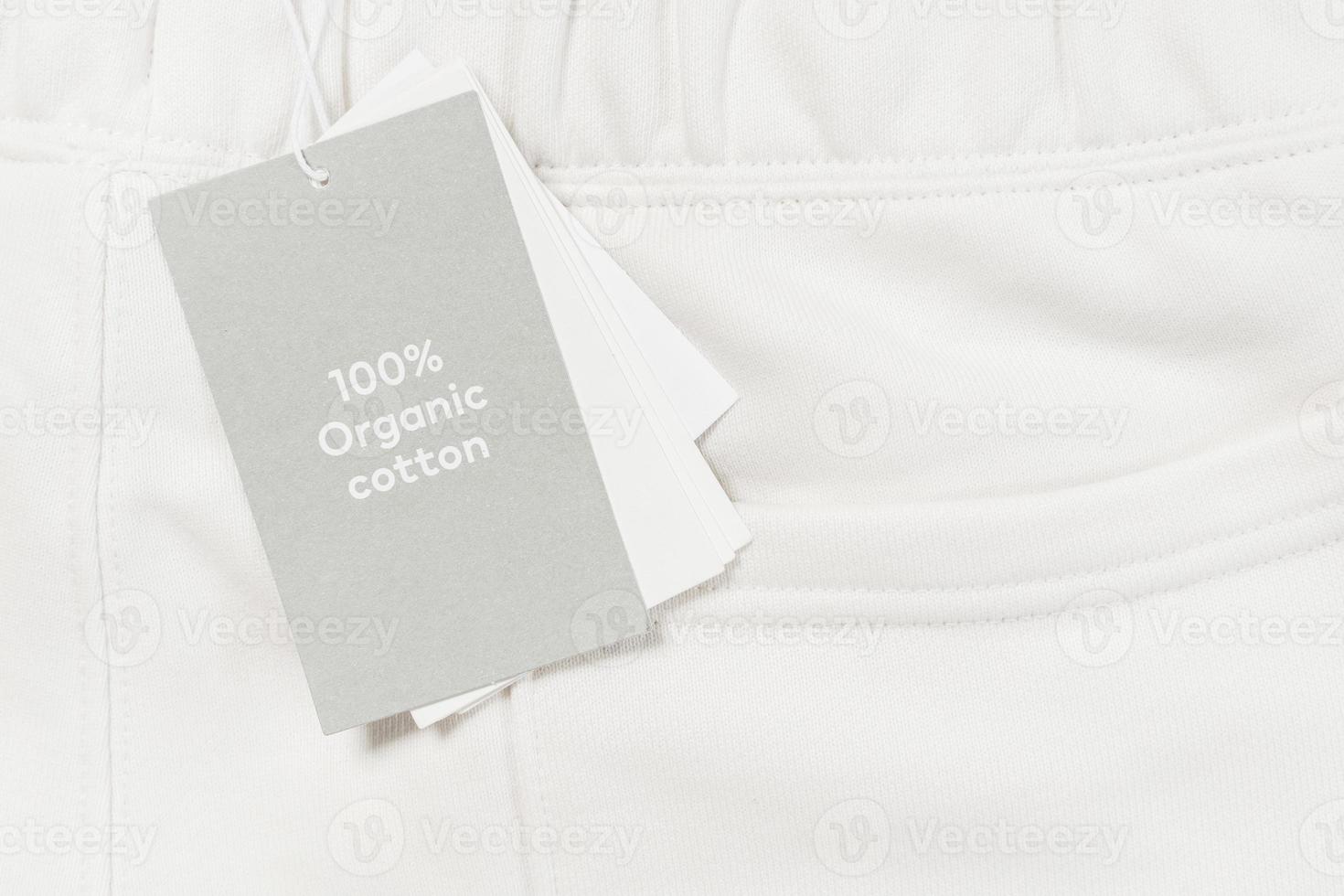 Paper label on a white 100 percent organic cotton clothing photo