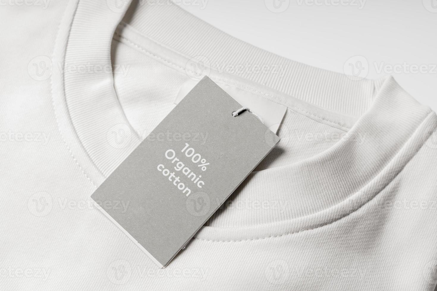 Paper label on a white 100 percent organic cotton clothing photo