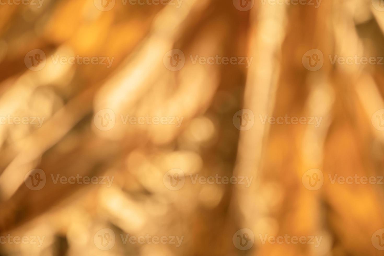 Abstract out of focus golden metallic background photo