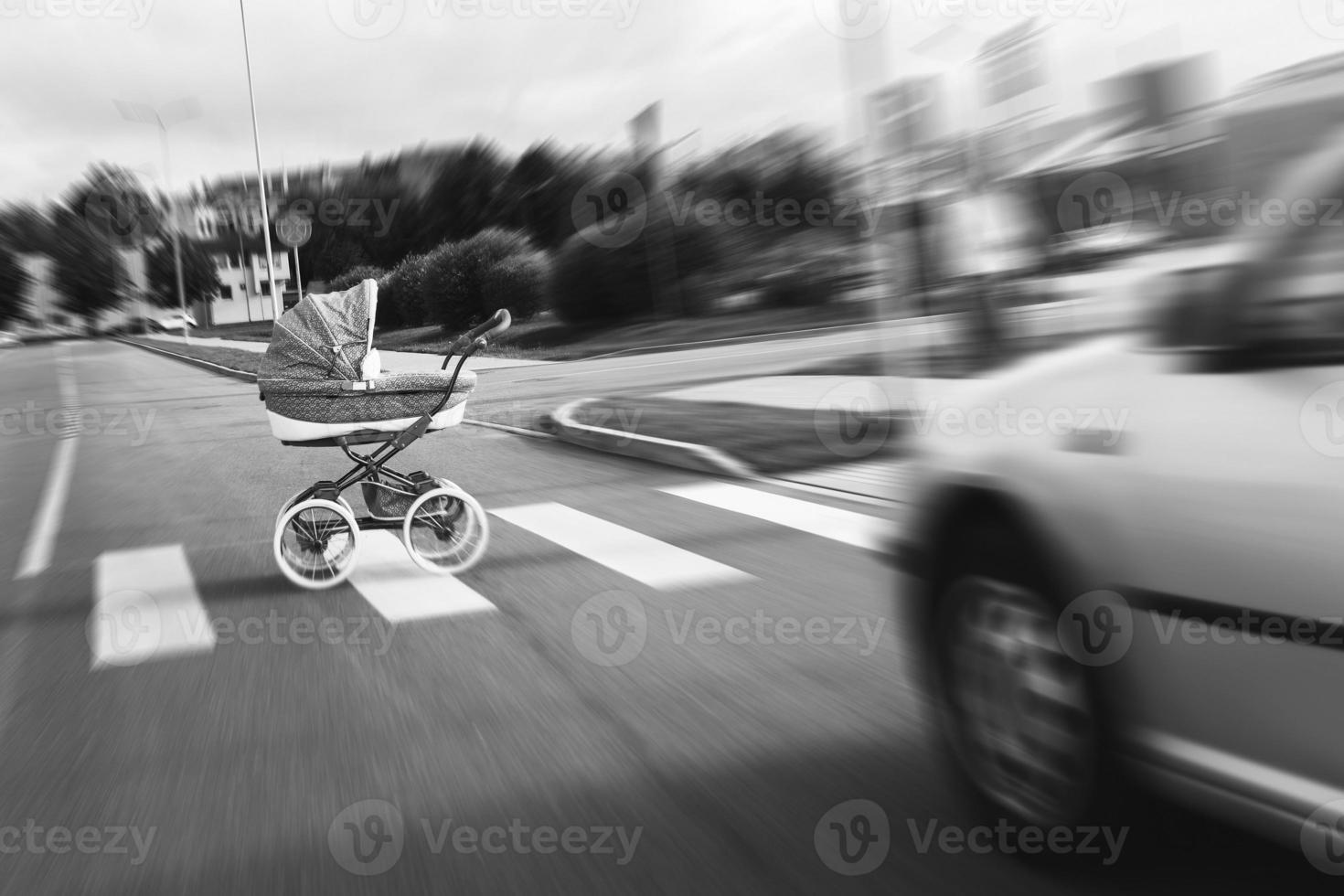Car accident on the crosswalk. Vehicle hits the baby pram at high speed. photo