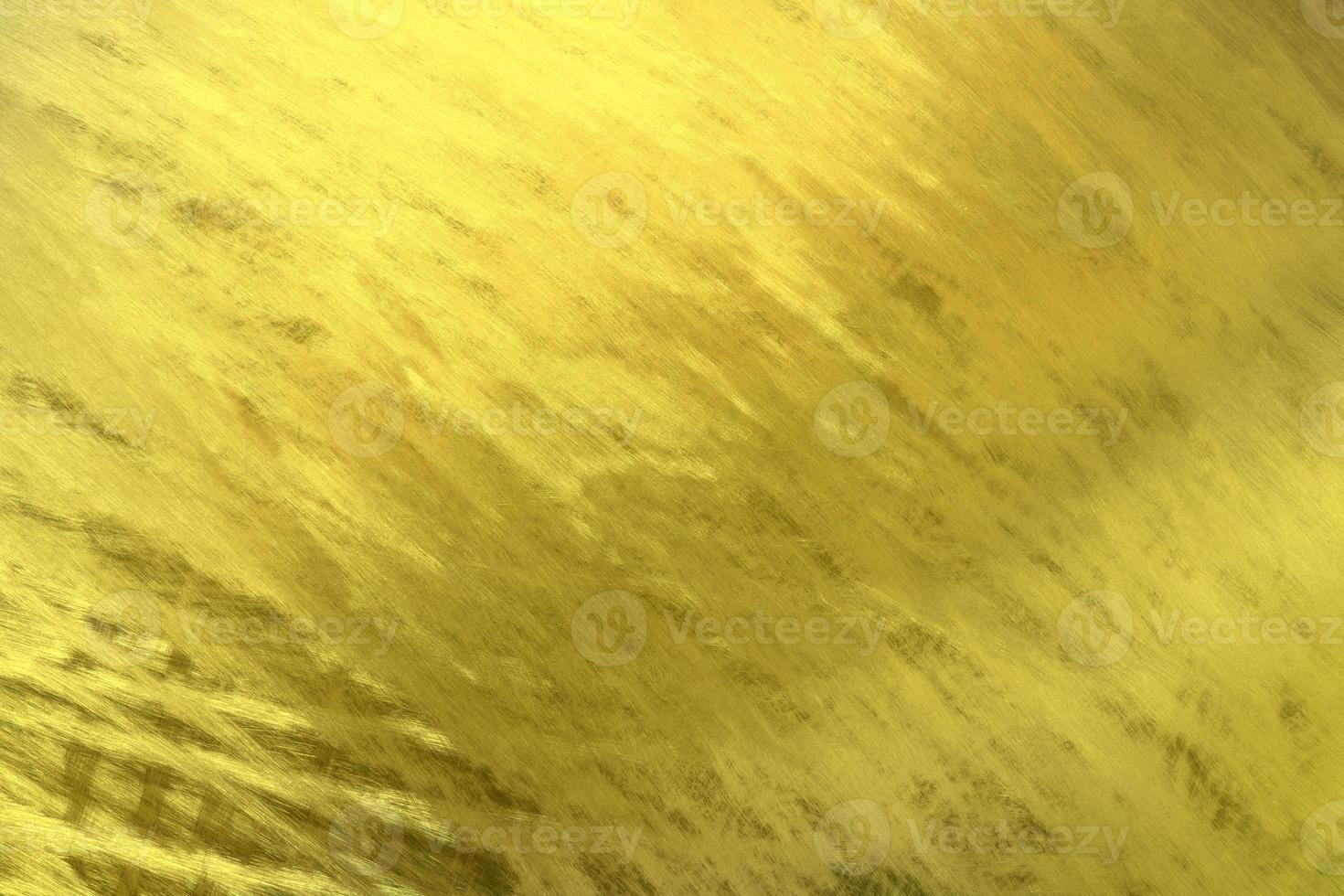Shiny golden metal wall texture background,gold pattern photo
