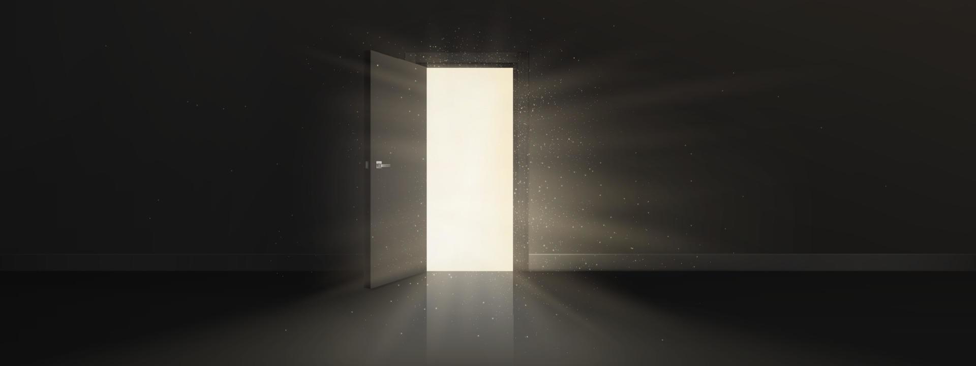 Open door with bright light behind in dark room vector