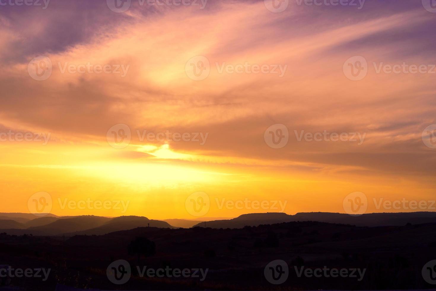 Beautiful view of the sunset over the mountains. photo