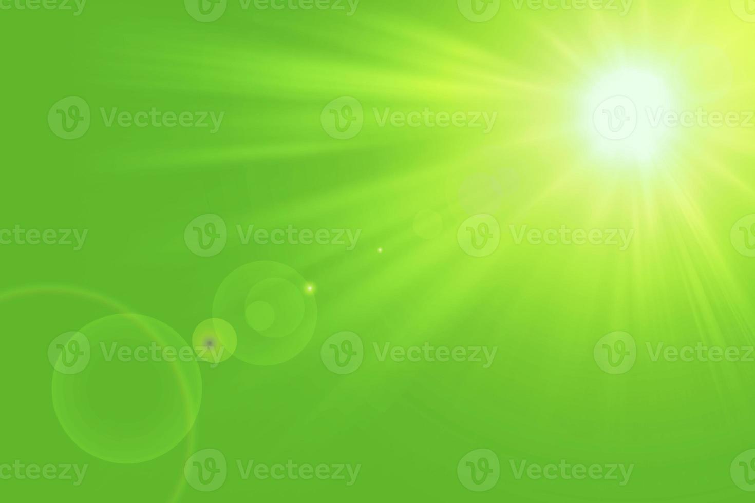 Natural green background with summer sun and lens flare. Sunlight on green natural background. photo