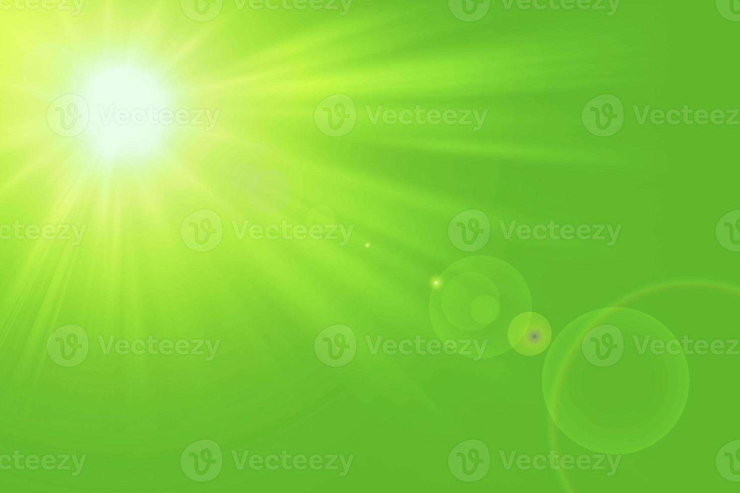 Natural green background with summer sun and lens flare. Sunlight on green natural background. photo