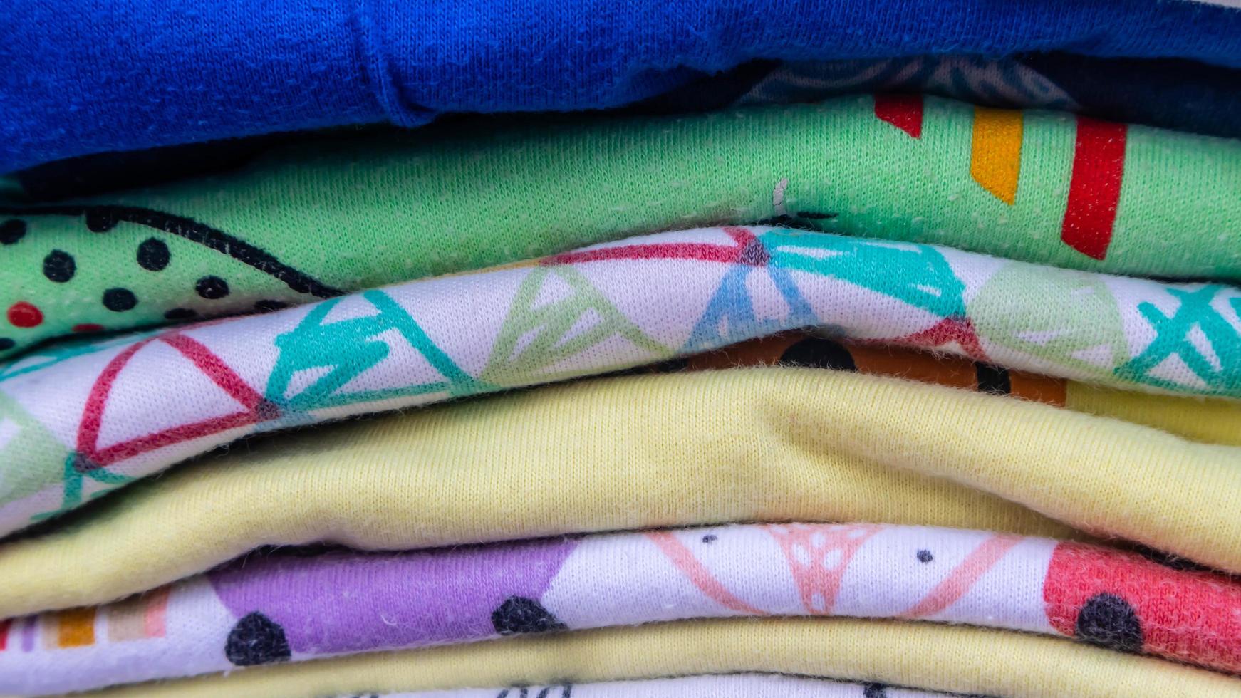stack of clothes as background photo