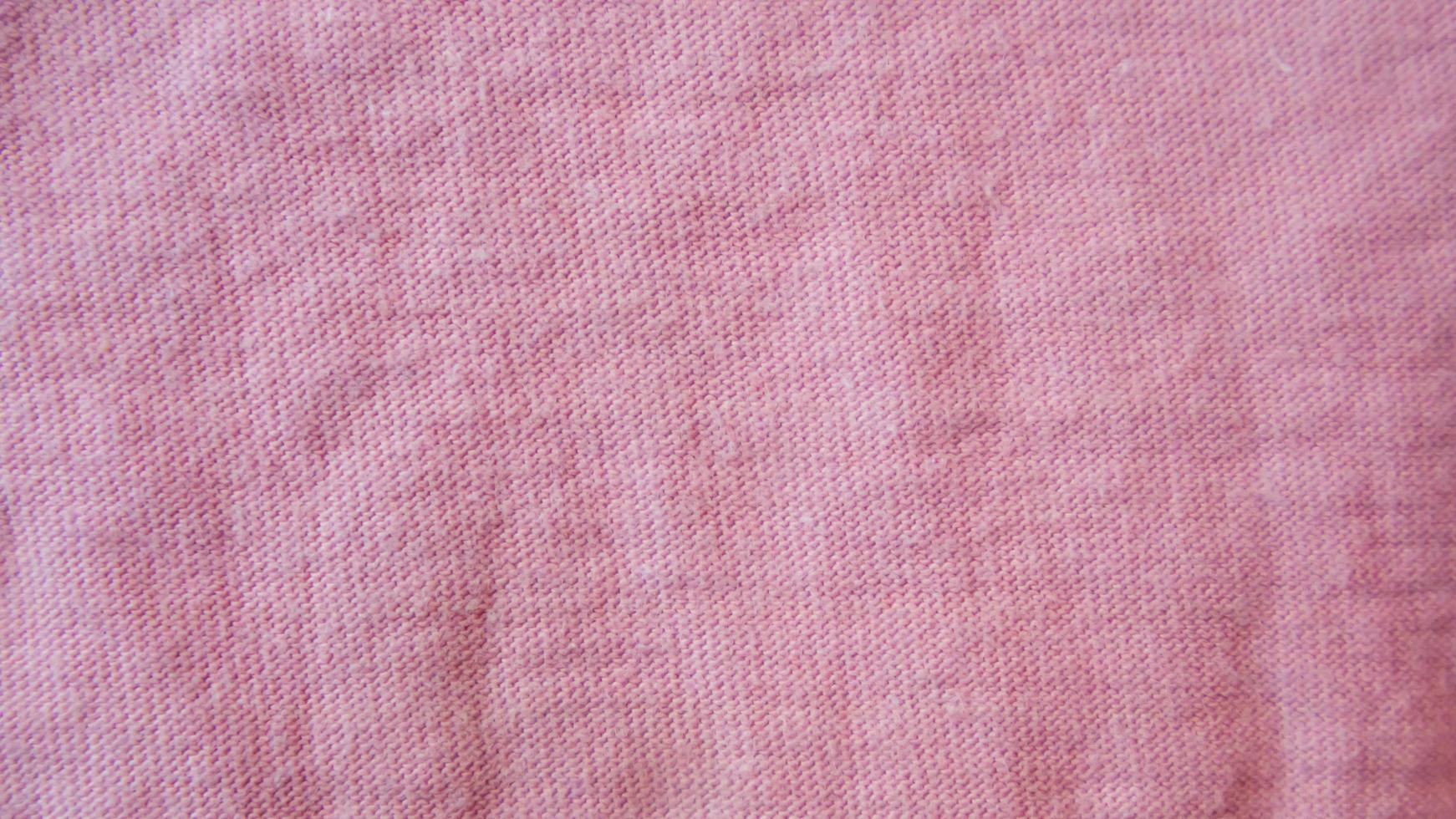 pink cloth texture as background photo