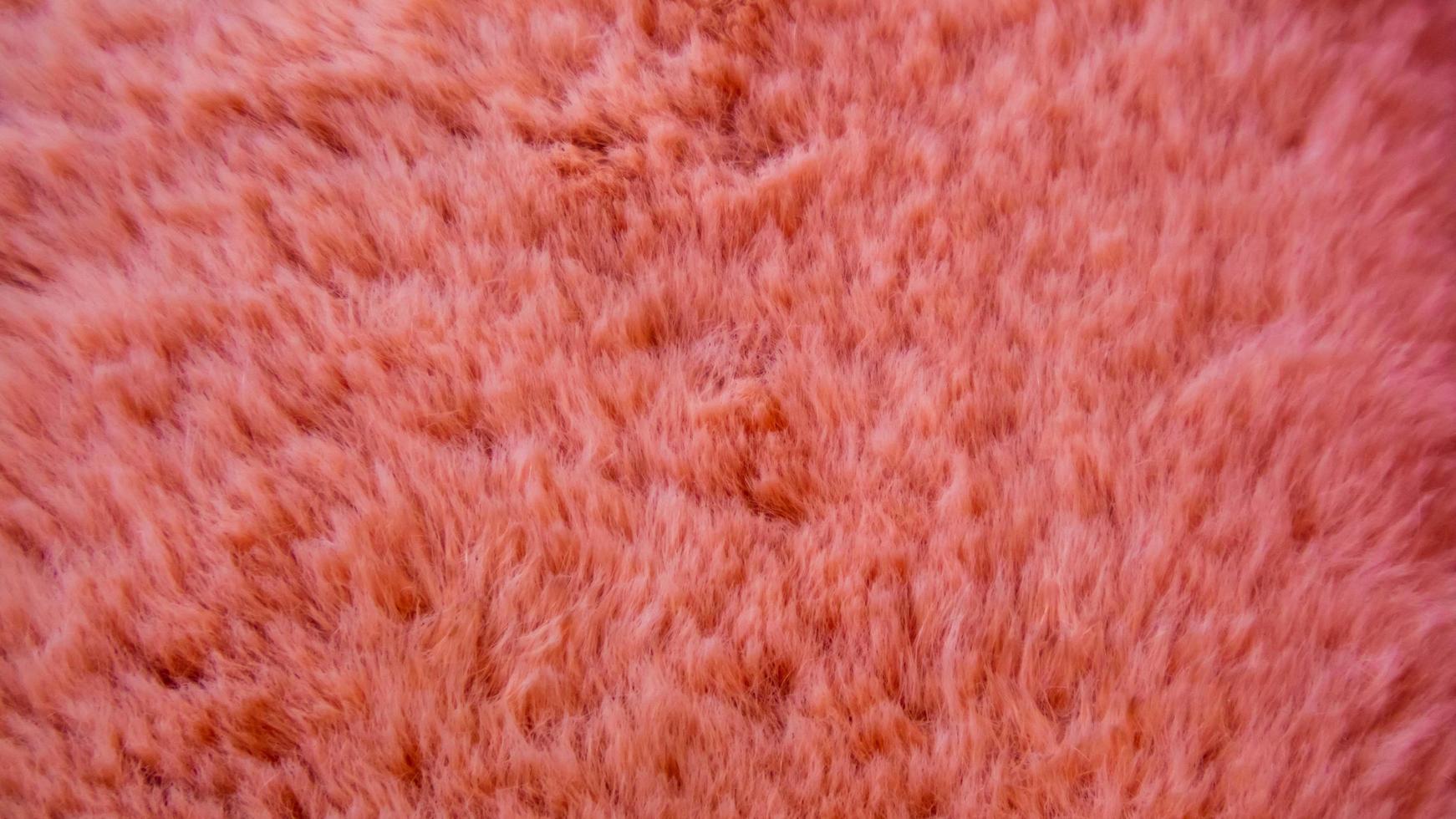 textura de lana rosa como fondo foto