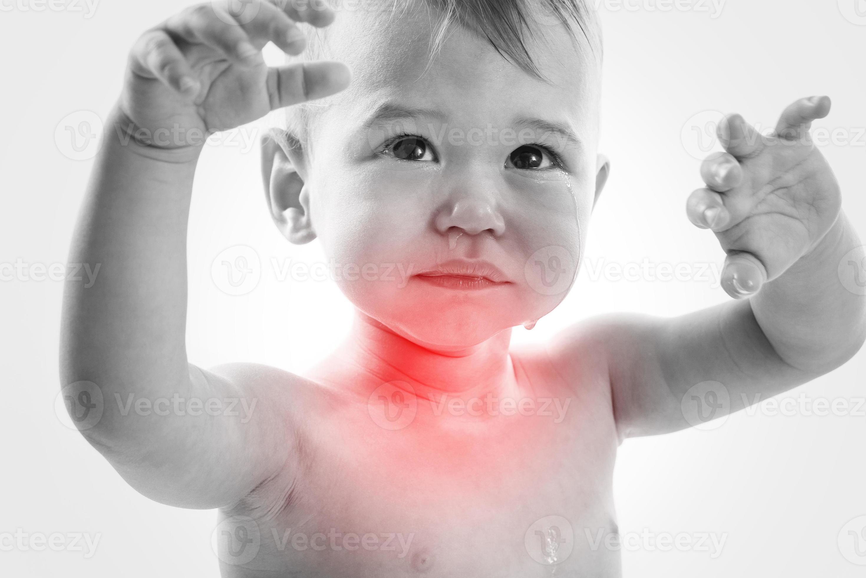 Crying baby suffering from sore throat pain 16264360 Stock Photo at