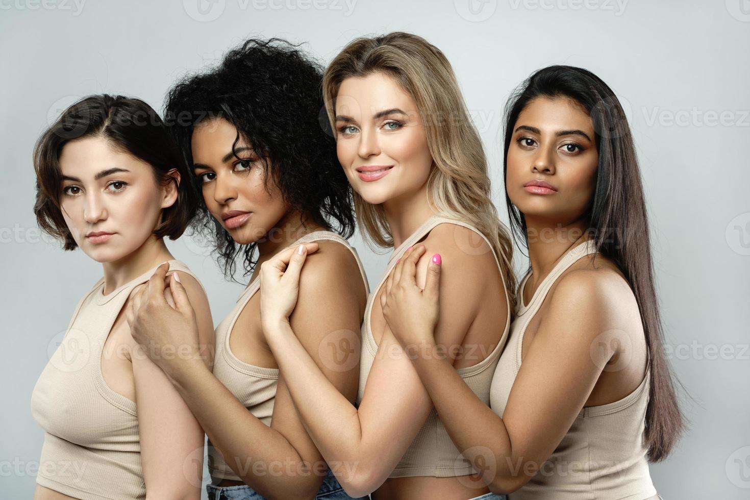 Multi-ethnic beauty and friendship. Group of beautiful different ethnicity women photo