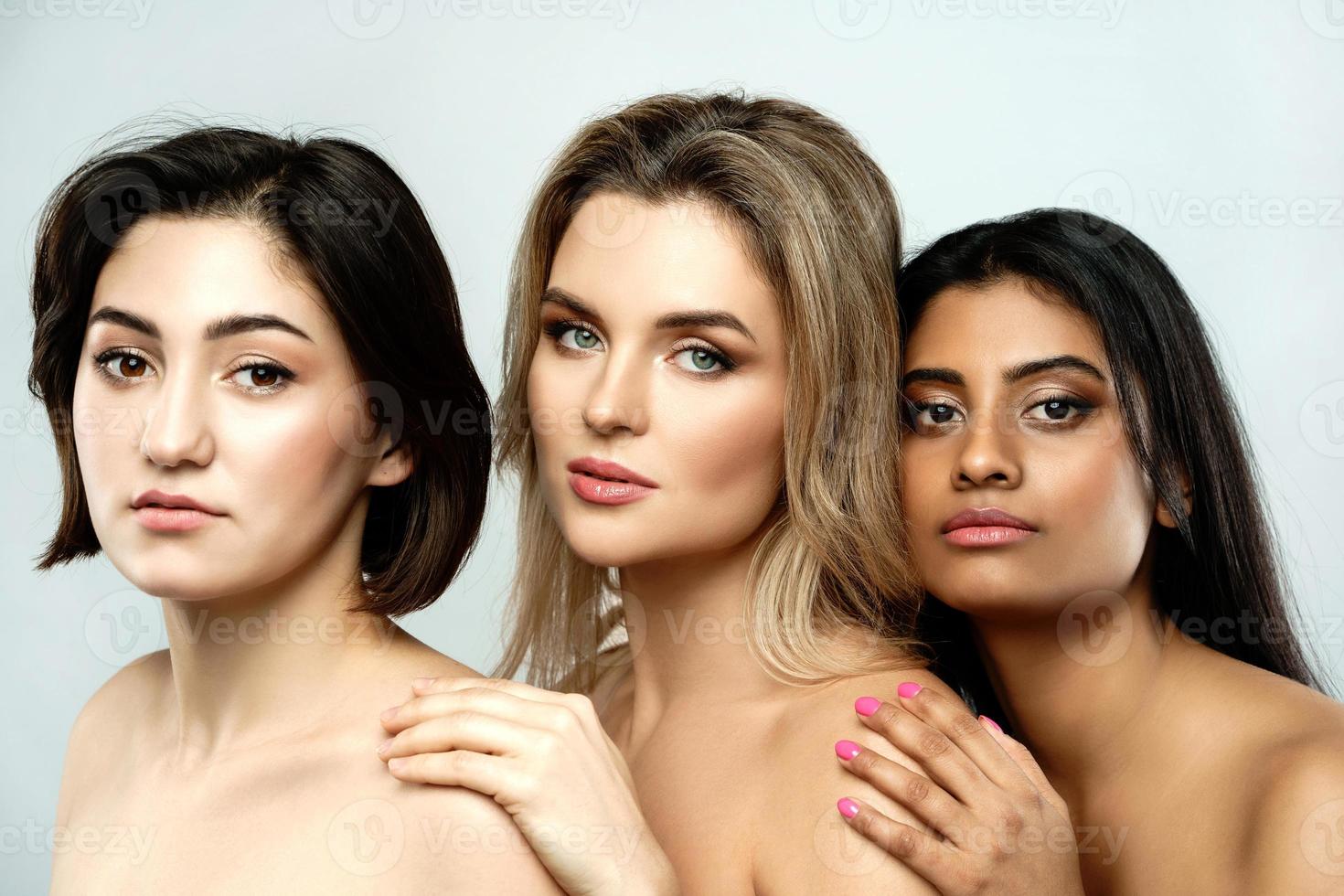 Multi-ethnic beauty and friendship. Group of beautiful different ethnicity women photo