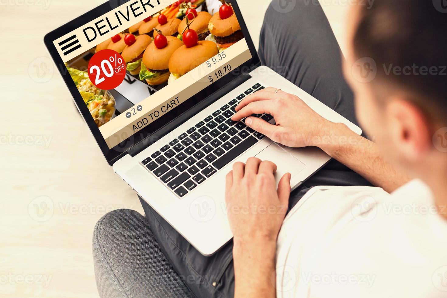 man laptop with app delivery food wine screen photo