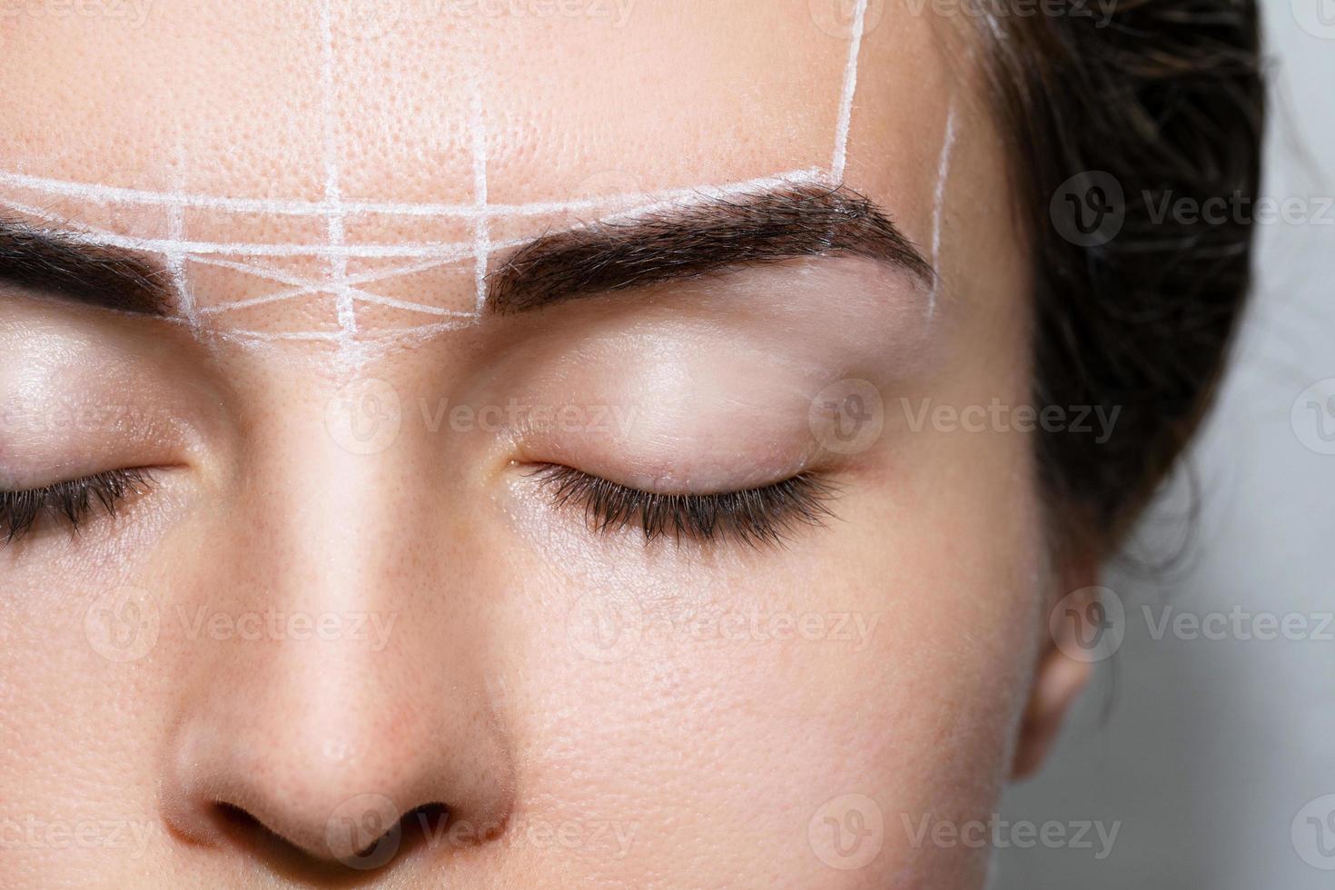 Woman during professional eyebrow mapping procedure 16264755 Stock