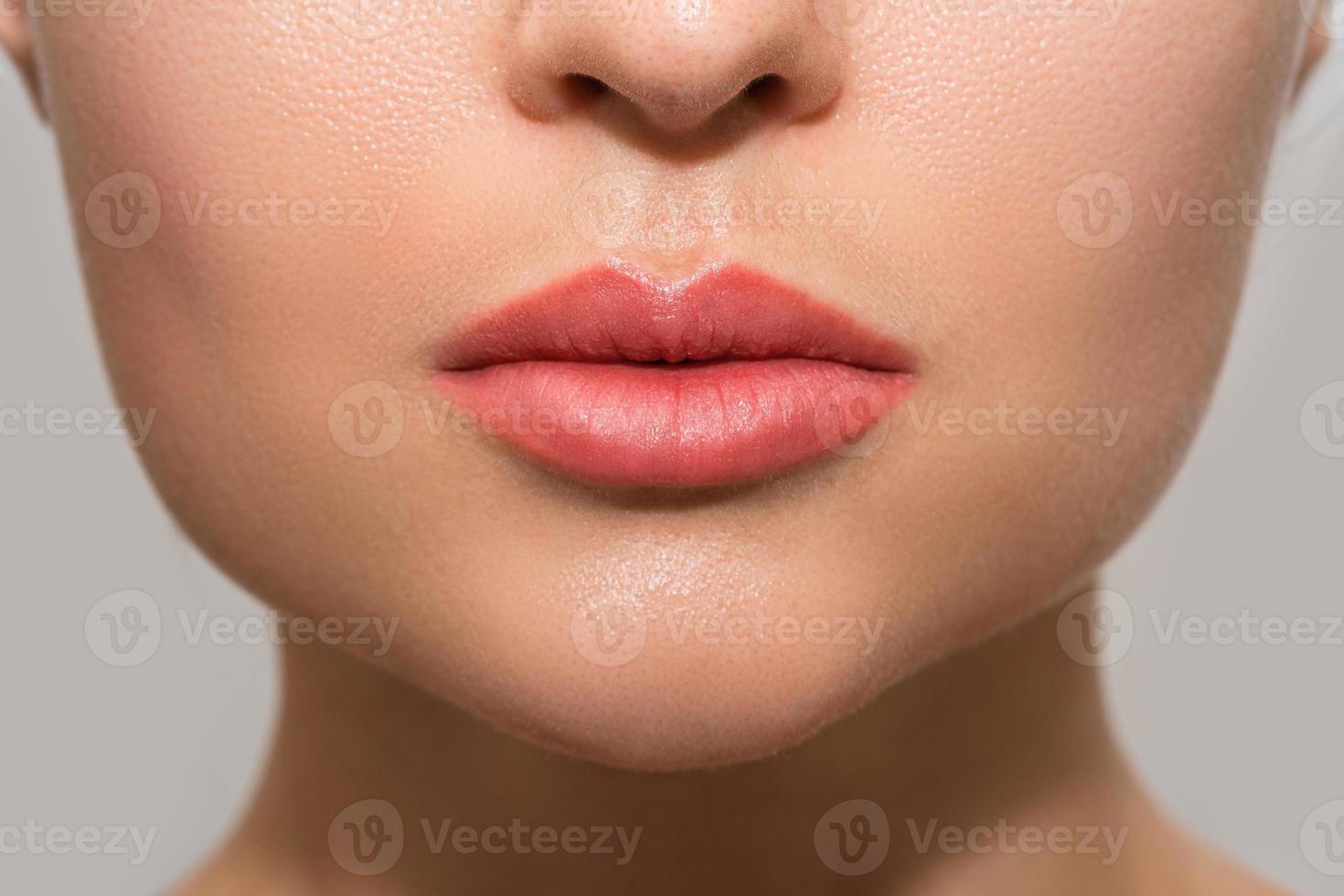 Female lips after permanent makeup lip blushing procedure 16264973