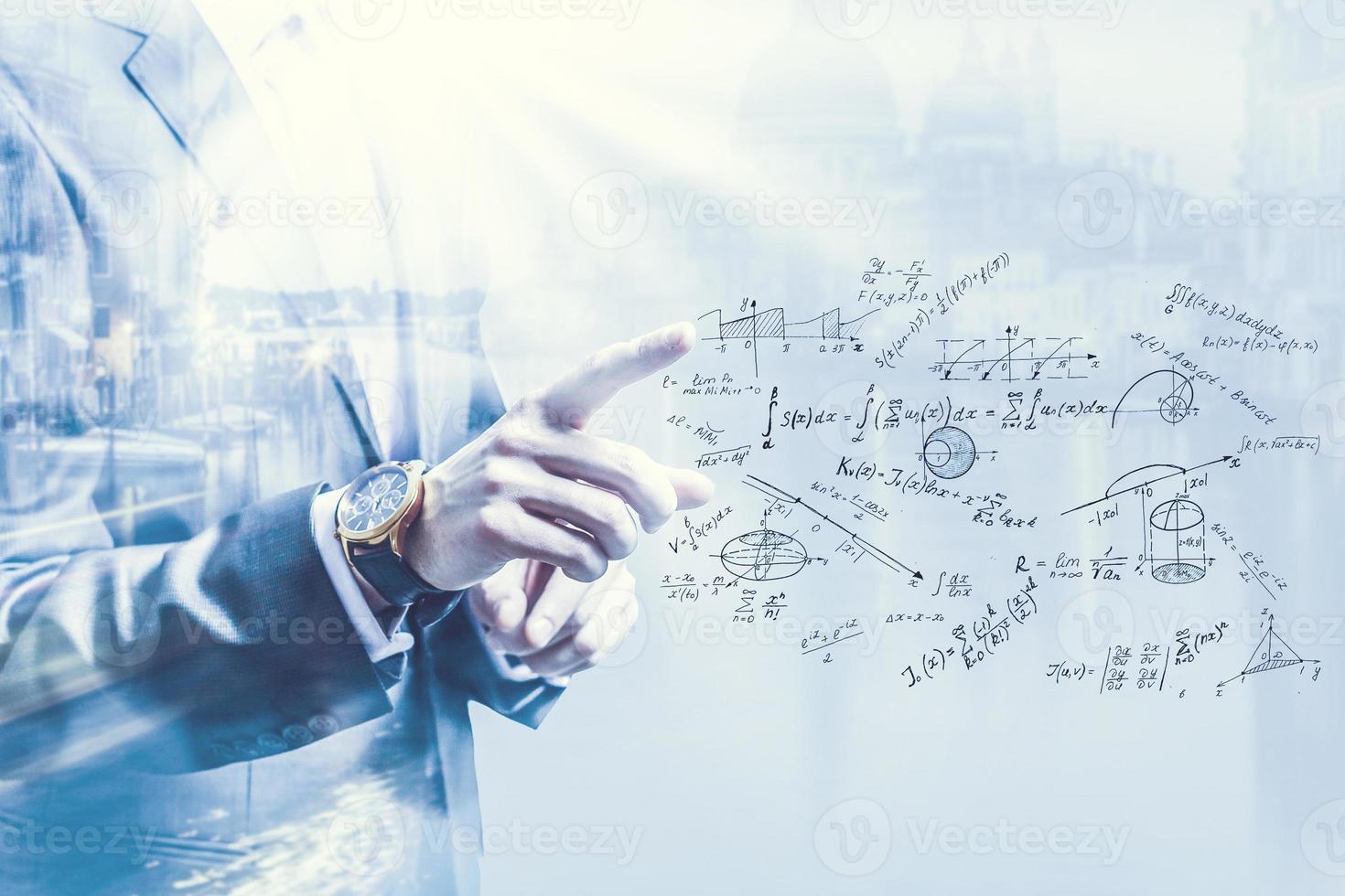 Business man pointing at growth graph and business concept. investment, business, future technology and money concept - closeup of man hand pointing at chart. photo