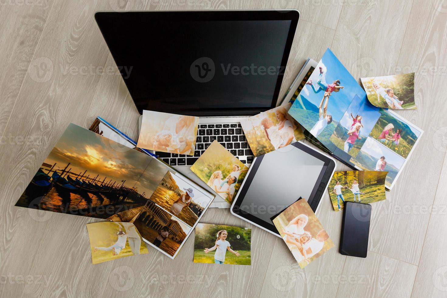 Hipster photography equipment with laptop and digital tablet on a vintage wooden desktop, flat lay photo