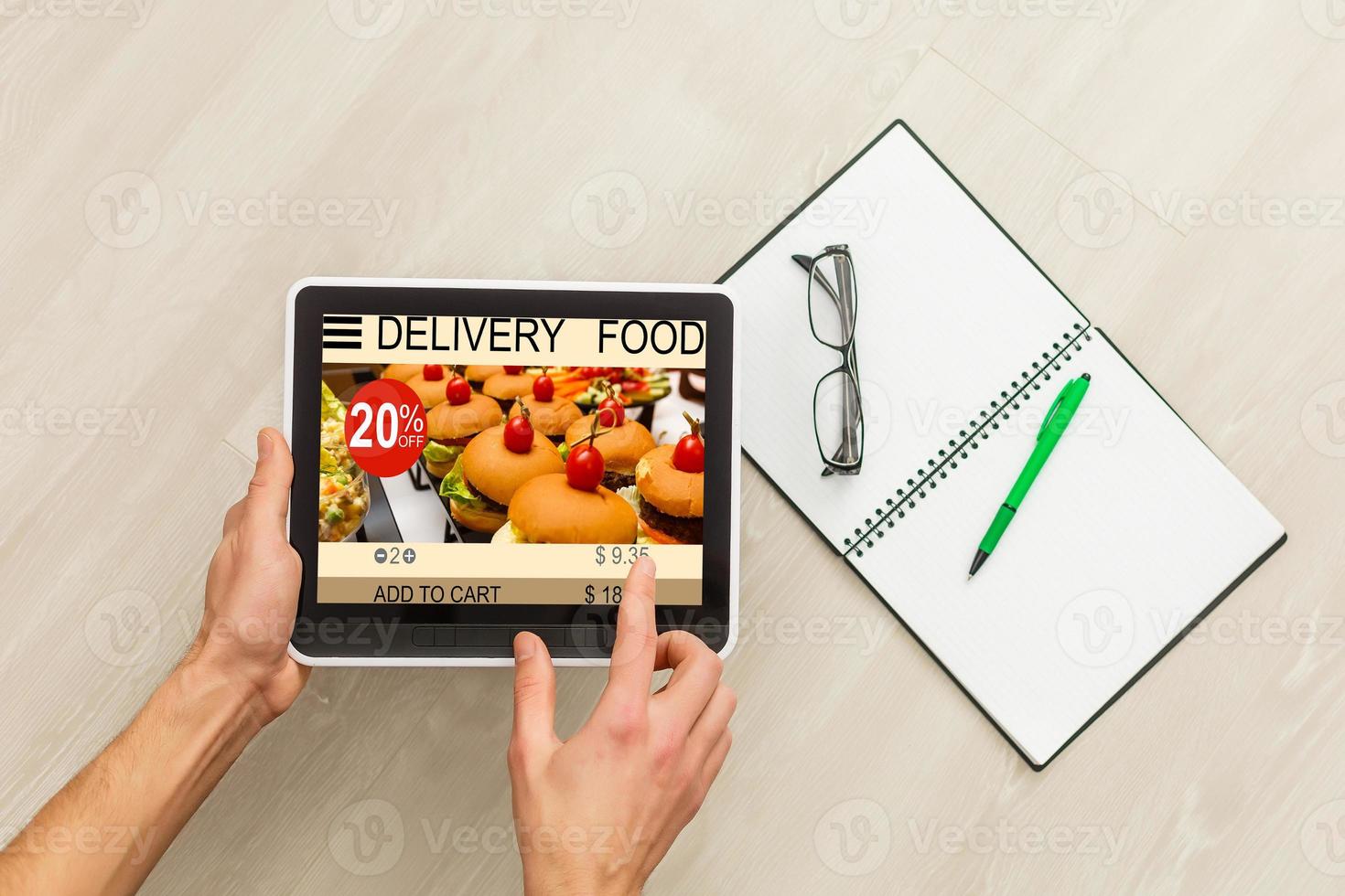 man tablet with app delivery food screen photo