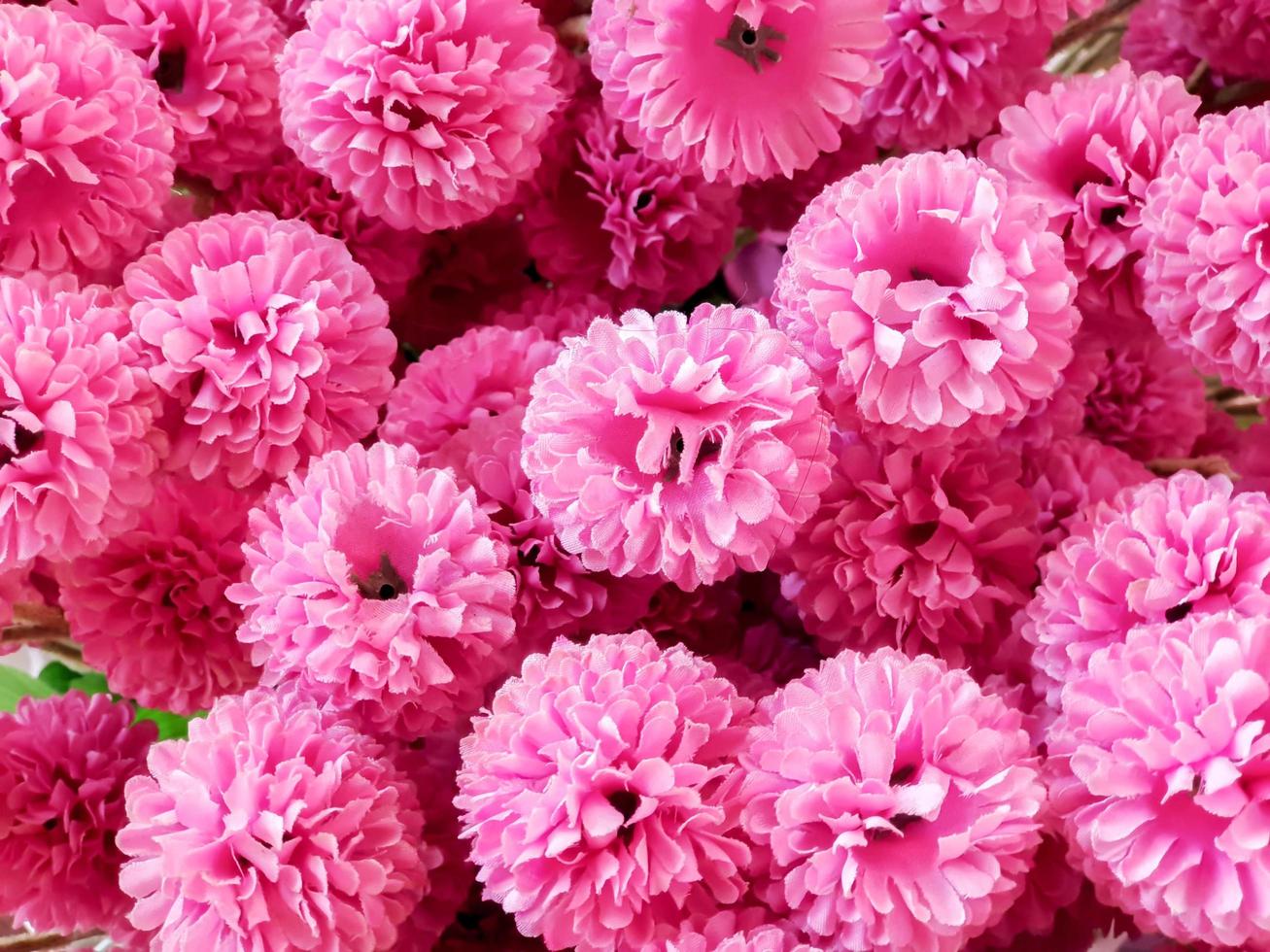 Closeup and top view fabric pink flowers fit to screen background and wallpaper. photo
